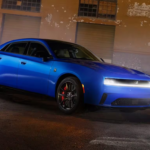 2026 Dodge Charger with headlights on at night outdoors