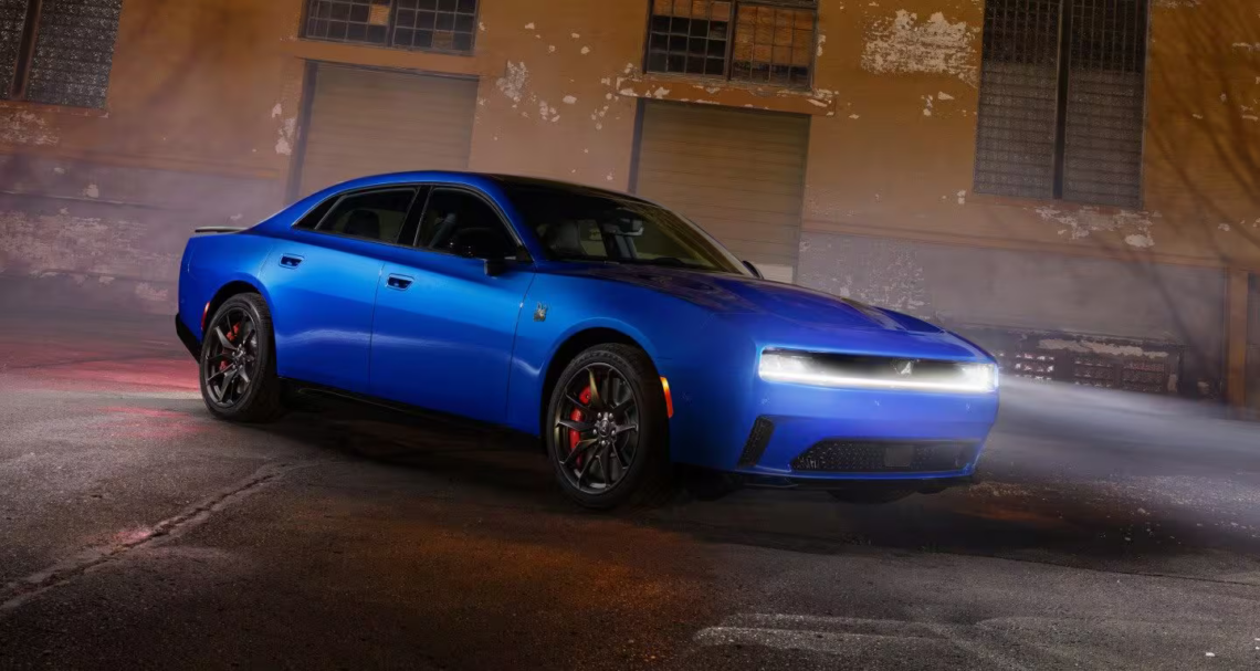 2026 Dodge Charger with headlights on at night outdoors